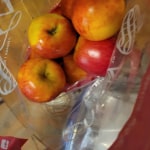 Envy Apple - We LOVE this display of organic Envy apples from Jones Farm at  New Seasons Market! #BiteAndBelieve 🍎