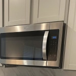 Whirlpool 1.7 cu. ft. Over the Range Microwave in Stainless Steel with  Electronic Touch Controls WMH31017HS - The Home Depot
