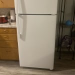 GE Appliances 16.6 Cu Ft. Top Freezer Refrigerator in Black