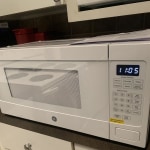 GE Profile™ 1.1 Cu. Ft. White Countertop Microwave, East Coast Appliance