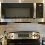 JVM3160DFBB GE ®1.6 Cu. Ft. Over-the-Range Microwave Oven BLACK - Jetson TV  & Appliance