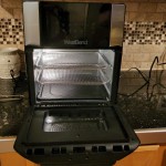West Bend Air Fryer Oven 12.6-Quart Electric Air Fryer with 10 Digital  Quick Menu Presets - Bake, Roast, Rotisserie, Dehydrate, Re-Heat,  1700-Watt, Black 