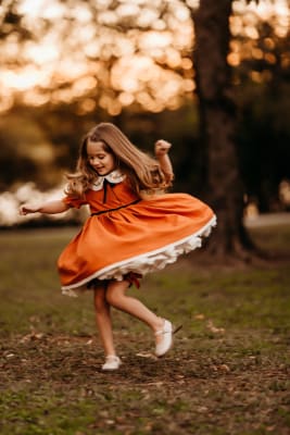 Outdoor Portrait Of Cute Little 8 Year Old Girl, Wearing Red Mary Jane  Dress Stock Photo, Picture and Royalty Free Image. Image 65006051.