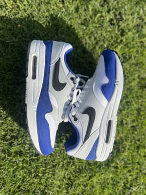 Feel the royal blue drip in these Nike Air Max 1's. 💙👑
