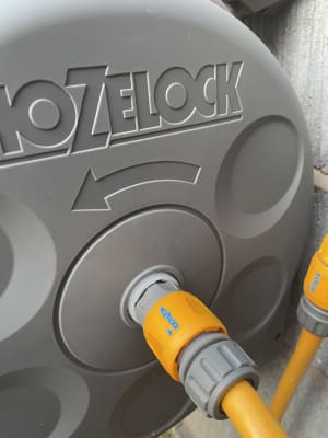 Hozelock 25M Compact 2in1 Wall Mounted Reel with Hose Perfect Watering  Solution 5055410433073