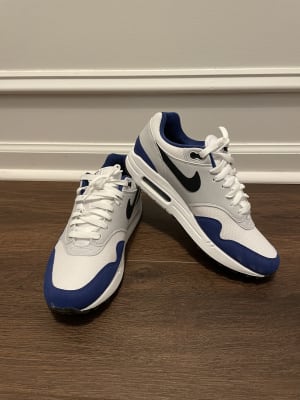 Feel the royal blue drip in these Nike Air Max 1's. 💙👑
