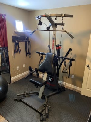 Bowflex XTL with 310 lbs of Power Rods, Lat and Leg Attachment Included