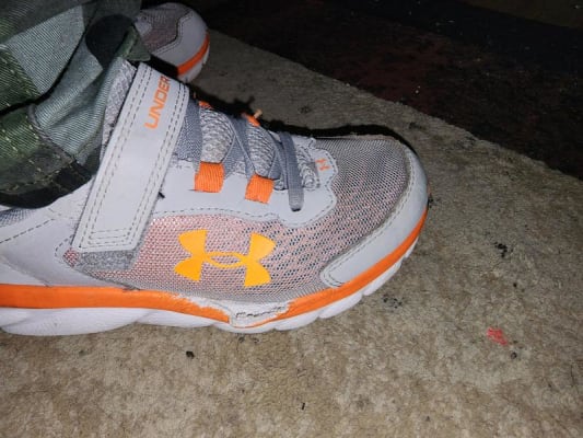 Boys orange 2024 under armour shoes