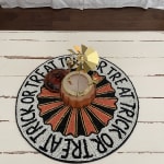 Round Orange and Black Trick or Treat Beaded Placemat