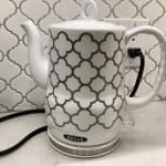 BELLA (13622) 1.2 Liter Electric Ceramic Tea Kettle W/ Base Black Floral