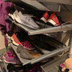 Elfa mesh gliding shoe shop shelf
