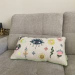 Ivory Textured Embroidered Eye Symbol Lumbar Pillow - World Market
